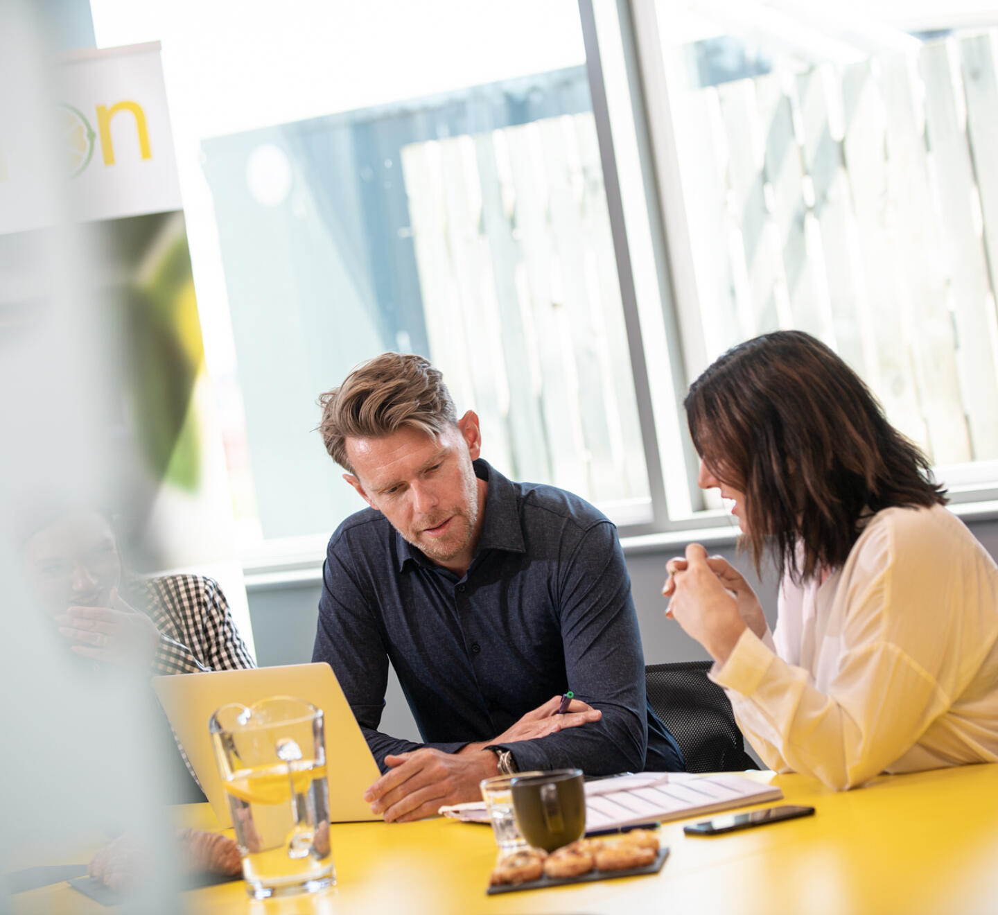 Lemon Contact Centre co-founders having conference room meeting