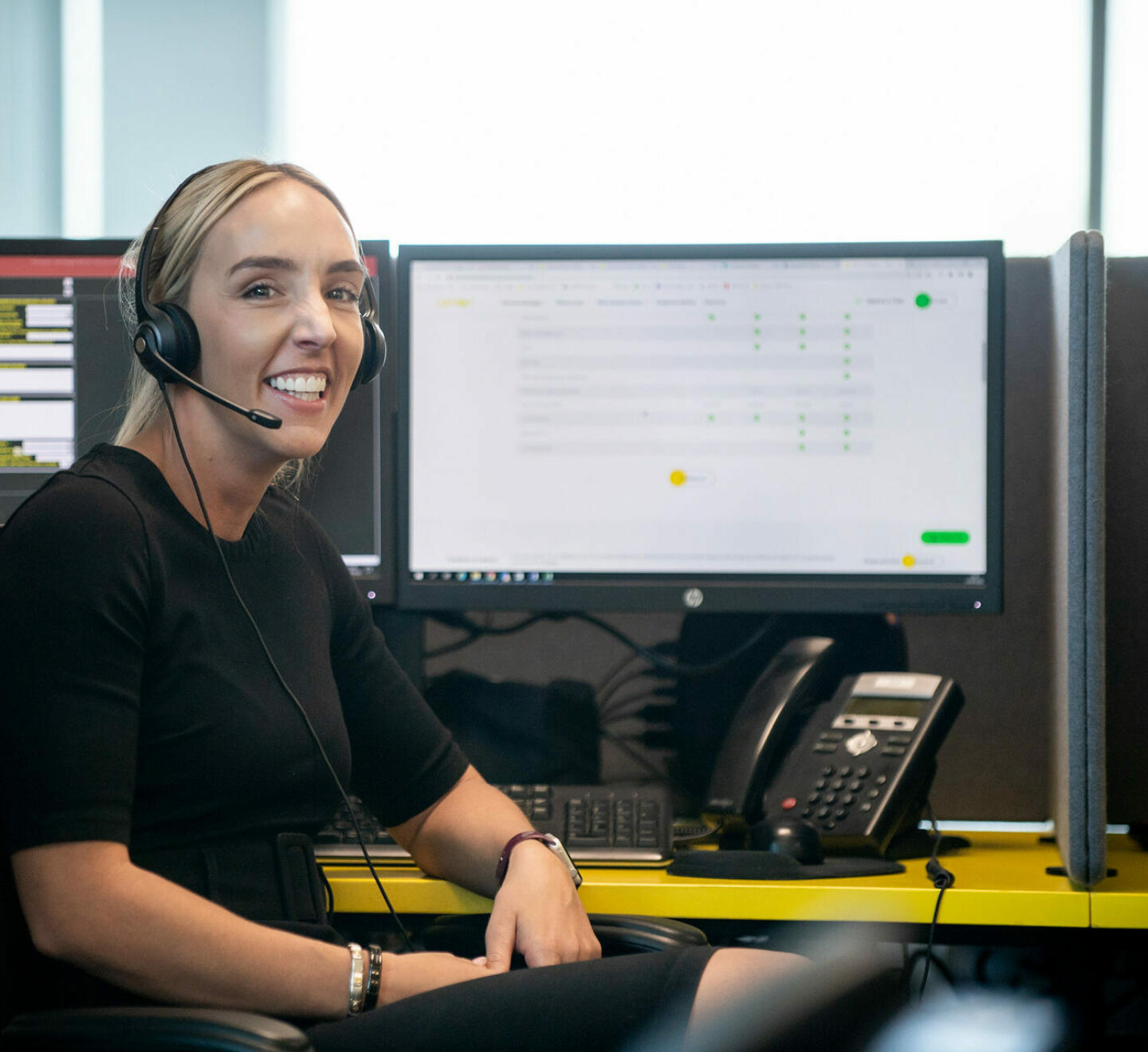 Lemon Contact Centre operator smiling looking at camera wearing heatset