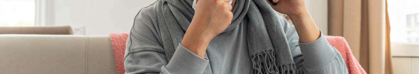 Person phoning to report a sickness absence