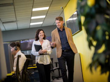 Lemon Contact Centre co-founders Martin & Lesley walking through the office