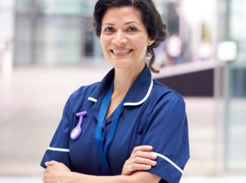 Hospital nurse with folded arms