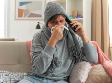 Person phoning to report a sickness absence