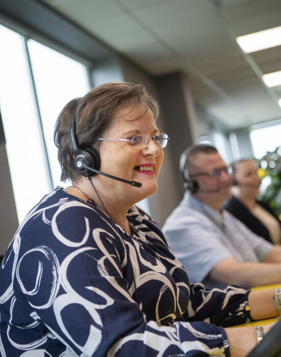 Lemon Contact Centre operator smiling whilst wearing headset