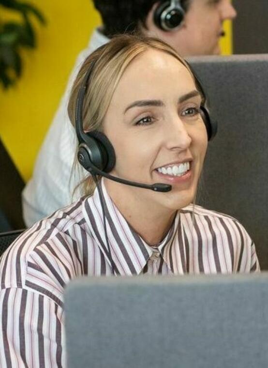 Lemon Contact Centre operator wearing headset and smiling