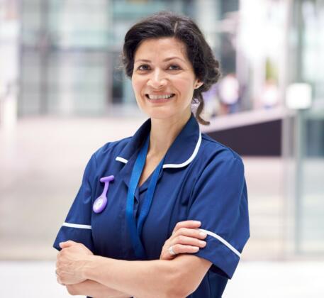 Hospital nurse with folded arms