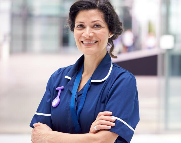 Hospital nurse with folded arms