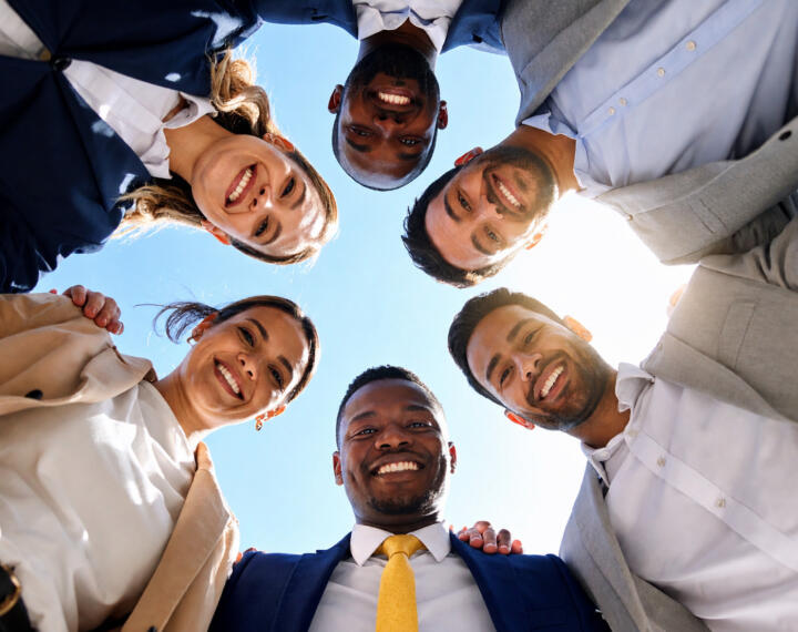 Unified Diverse Team Looking Down Group Collaboration and Success