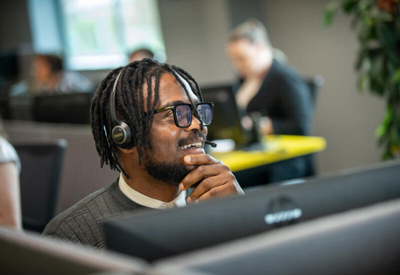 Lemon Contact Centre operator wearing headset for call handling