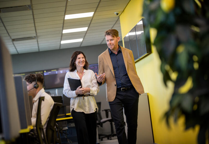 Lemon Contact Centre co-founders Martin & Lesley walking through the office