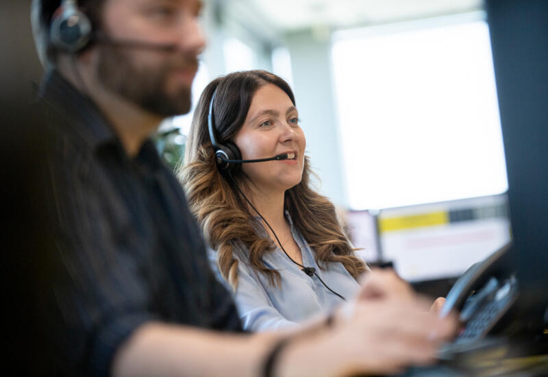 Male and female call centre operators at Lemon Contact Centre