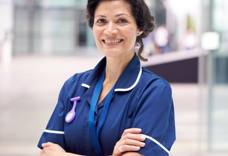 Hospital nurse with folded arms