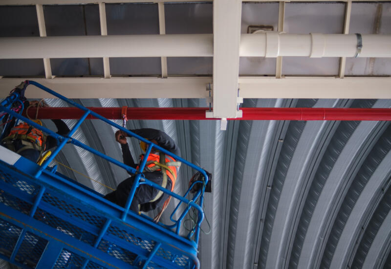 Fire sprinker maintenance at a height