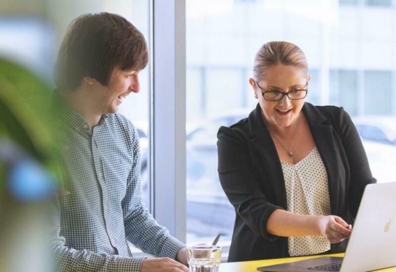 Business team managing structured outsourcing workflows