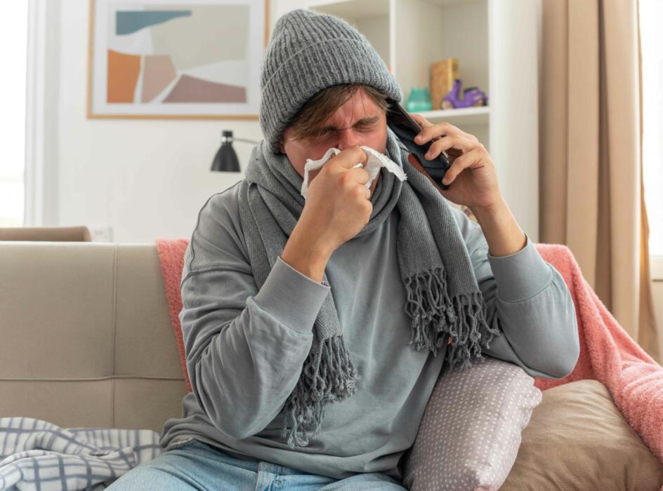 Person phoning to report a sickness absence